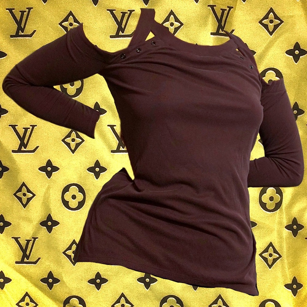dull purple-maroon shirt with holes in shoulders